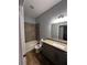 Bathroom with tile flooring, a granite vanity, and a tiled shower-tub combination at 567 Viceroy Ct, Kissimmee, FL 34758
