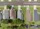 Aerial view of the neighborhood with multiple houses at 5729 Norman H Cutson Dr, Orlando, FL 32821