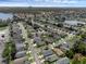 Aerial view of the neighborhood showcasing the home's location near lakes and green spaces at 5729 Norman H Cutson Dr, Orlando, FL 32821