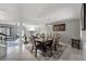 Dining room with neutral wall color, and decoratively styled chairs around the dark wood table at 658 Lake Villas Dr, Altamonte Springs, FL 32701
