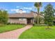 Inviting community entrance with lush landscaping at 658 Lake Villas Dr, Altamonte Springs, FL 32701
