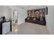 Inviting living room with tile floors and a decorative built-in shelf for personal items at 658 Lake Villas Dr, Altamonte Springs, FL 32701
