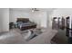 Spacious main bedroom with modern furnishings, a ceiling fan, and a light colored carpet at 658 Lake Villas Dr, Altamonte Springs, FL 32701