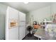 Storage room with a refrigerator, freezer and stainless-steel countertops at 7135 Sw 129Th St, Ocala, FL 34473