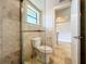 Bathroom with a tiled shower and updated fixtures at 7679 Bent Bow Trl, Winter Park, FL 32792