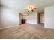 Large bedroom with a ceiling fan and ensuite bathroom featuring a granite vanity at 7679 Bent Bow Trl, Winter Park, FL 32792