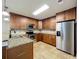 Well-equipped kitchen featuring granite countertops and stainless steel appliances at 7679 Bent Bow Trl, Winter Park, FL 32792