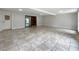 Bright living room featuring tile floors, recessed lighting, and access to the outside at 7679 Bent Bow Trl, Winter Park, FL 32792