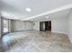 Spacious room featuring tile floors, recessed lighting, and access to the outside with large closet space at 7679 Bent Bow Trl, Winter Park, FL 32792