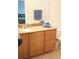 Bathroom with a vanity, sink, and ample counter space for toiletries and personal items at 7842 Holiday Isle Dr # 102, Belle Isle, FL 32812