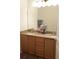 Bathroom with double sinks, plenty of counter space, and a large mirror at 7842 Holiday Isle Dr # 102, Belle Isle, FL 32812