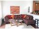 Cozy living room with modern furniture, an area rug, and a contemporary artwork at 7842 Holiday Isle Dr # 102, Belle Isle, FL 32812