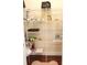 Spacious pantry with adjustable shelving for optimal storage at 7842 Holiday Isle Dr # 102, Belle Isle, FL 32812