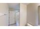 Bathroom featuring a tiled shower/tub combo and a white door to the hallway at 8520 La Isla Dr, Kissimmee, FL 34747