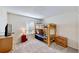 This cozy bedroom features bunkbeds, soft carpet, and a bright window at 8520 La Isla Dr, Kissimmee, FL 34747