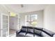 Cozy sunroom with tile floors and lots of natural light at 8520 La Isla Dr, Kissimmee, FL 34747