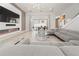 Spacious living room with fireplace, glass doors to backyard and modern decor at 9743 Covent Garden Dr, Orlando, FL 32827