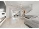 Bright living room features a fireplace, sliding glass doors, and plush seating at 9743 Covent Garden Dr, Orlando, FL 32827