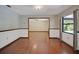 Dining room showing hardwood floors, half walls and view to the pool at 102 Ichabod Trl, Longwood, FL 32750