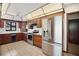 Updated kitchen with stainless steel appliances and bright white countertops at 102 Ichabod Trl, Longwood, FL 32750