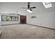 Expansive living room with brick fireplace and lots of natural light at 102 Ichabod Trl, Longwood, FL 32750