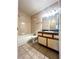 Well-lit bathroom featuring a bathtub and a single sink vanity at 1057 S Hiawassee Rd # 1913, Orlando, FL 32835