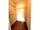 Walk-in closet featuring built-in wire shelving and ample space for storage and organization at 1057 S Hiawassee Rd # 1913, Orlando, FL 32835