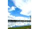 Scenic view of neighborhood homes by the lake at 1057 S Hiawassee Rd # 1913, Orlando, FL 32835
