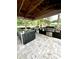 Community outdoor kitchen offers stainless steel grills and countertop space at 1057 S Hiawassee Rd # 1913, Orlando, FL 32835