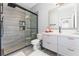 Modern bathroom featuring a walk-in shower, sleek vanity, and stylish fixtures at 13108 Lakeshore Grove Dr, Winter Garden, FL 34787