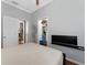Bedroom with a queen bed, hardwood floors, an open closet and access to an adjacent bathroom at 13108 Lakeshore Grove Dr, Winter Garden, FL 34787