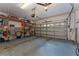 This is a two-car garage with room for parking, storage, and hobbies at 13108 Lakeshore Grove Dr, Winter Garden, FL 34787