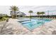 Community pool with inviting lounge area at 1454 Pinecliff Dr, Apopka, FL 32703