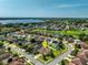 Serene community featuring lush landscaping, water views, and a convenient location near a lake and golf course at 15058 Sawgrass Bluff Dr, Winter Garden, FL 34787