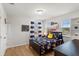 Youth bedroom features fun decor, bright windows and light wood floors at 15058 Sawgrass Bluff Dr, Winter Garden, FL 34787