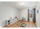 Playroom featuring light wood floors, large window, and cube storage at 15058 Sawgrass Bluff Dr, Winter Garden, FL 34787