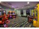 Community arcade room with an assortment of games at 1533 Flange Dr, Davenport, FL 33896