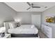 Bedroom boasting neutral tones, a comfortable queen bed, and a flat-screen TV at 1533 Flange Dr, Davenport, FL 33896