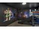 Themed bedroom with unique Star Wars decor and custom bunk beds for a memorable experience at 1533 Flange Dr, Davenport, FL 33896