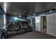 Home theater room featuring a large screen, comfortable seating, themed wall panels at 1533 Flange Dr, Davenport, FL 33896