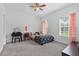 Cozy bedroom with a vanity table and bright windows providing ample natural light at 1550 Bluewater Run, Chuluota, FL 32766