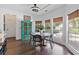 Bright dining area featuring hardwood floors, and natural light from the windows at 1550 Bluewater Run, Chuluota, FL 32766