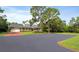 Charming two-story home with a wide front porch and well-maintained landscaping, ideal for peaceful living at 1550 Bluewater Run, Chuluota, FL 32766