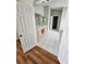 Large primary bath featuring tile flooring, dual sinks, and separate lavatory at 1710 Canoe Creek Rd, Oviedo, FL 32766