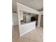 Open kitchen with a breakfast bar and modern appliances with views to living spaces at 1710 Canoe Creek Rd, Oviedo, FL 32766