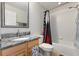 This cozy bathroom features a granite sink, a shower, and a bath at 2046 Westover Reserve Blvd, Windermere, FL 34786