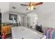 Bedroom featuring hardwood floors and an air hockey table at 2046 Westover Reserve Blvd, Windermere, FL 34786