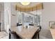 Dining area with a view of the screened in lanai and private pool at 2046 Westover Reserve Blvd, Windermere, FL 34786
