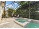 The screened-in lanai with hot tub offers a private relaxation space at 2046 Westover Reserve Blvd, Windermere, FL 34786