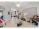 Open concept living space with high ceilings, piano, and lots of natural light at 2046 Westover Reserve Blvd, Windermere, FL 34786